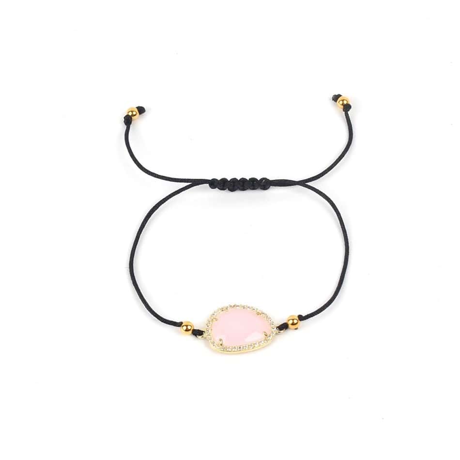 Bracelets femmes cordon coton Bracelet ajustable en cordon noir avec pendentif en pierre rose et détails dorés, idéal pour la mode bijoux féminins.