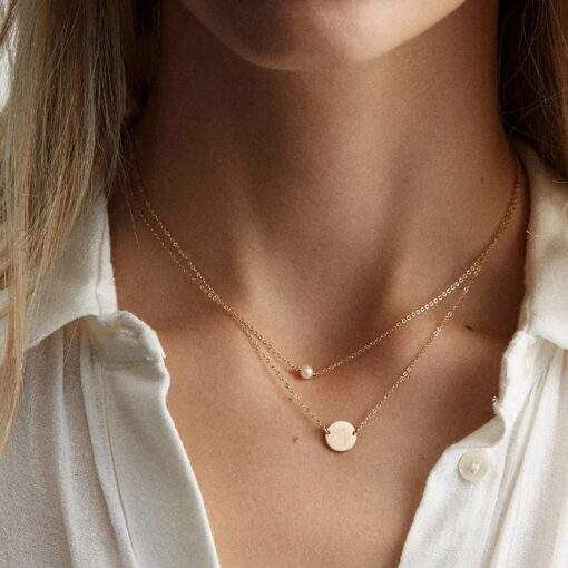 Collier ras du cou perle blanche plaque or rose